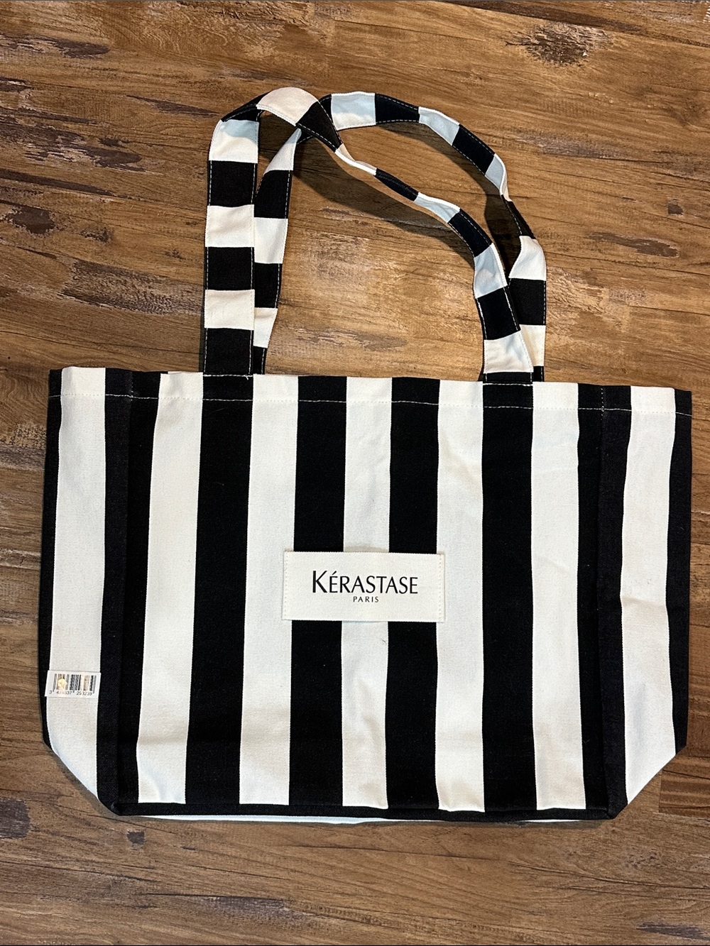 Kérastase Black and White Striped Tote Bag